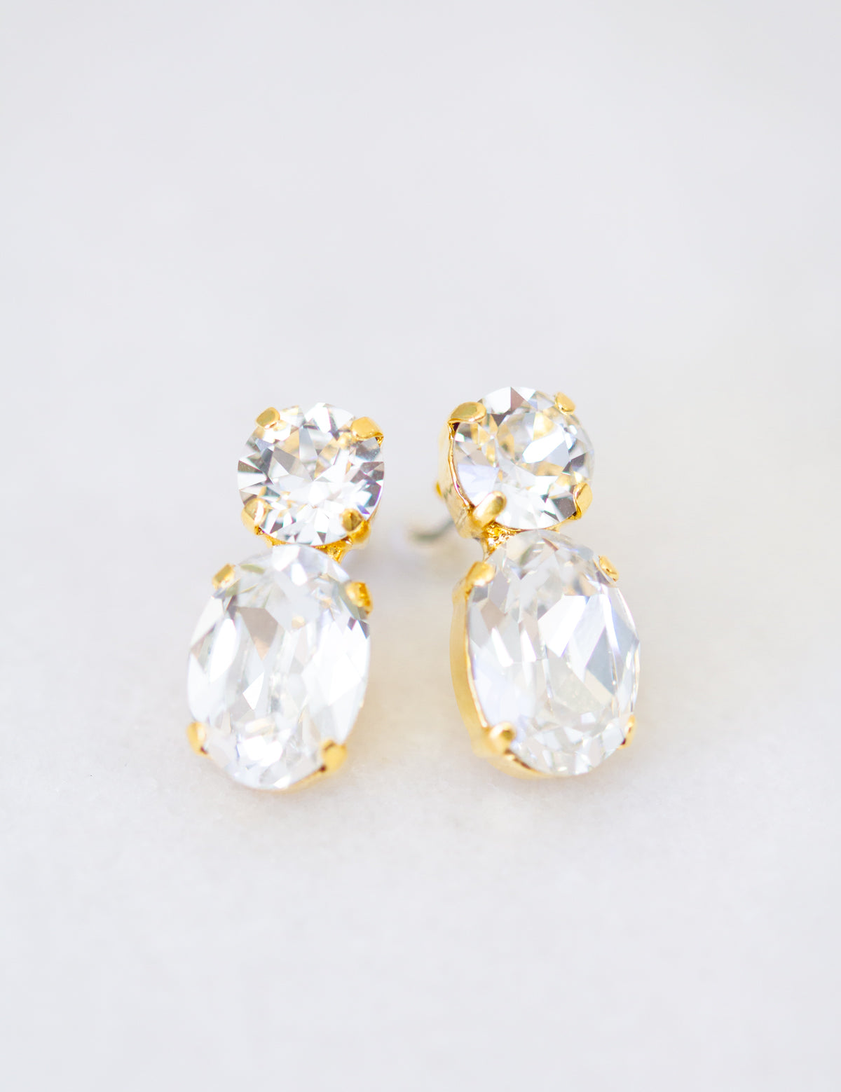 bridal earrings
wedding jewelry
teardrop earrings
wedding accessories
fine jewelry
elegant bridal style
bride jewelry
wedding sparkle
bridal accessories
timeless wedding style
wedding day jewelry
jewelry for brides
classic wedding look
bridal elegance
luxury wedding jewelry
wedding inspiration
wedding fashion
statement earrings for brides
wedding day details
jewelry for weddings