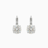 Pair of silver leverback hoop earrings with clear gemstones on a white background