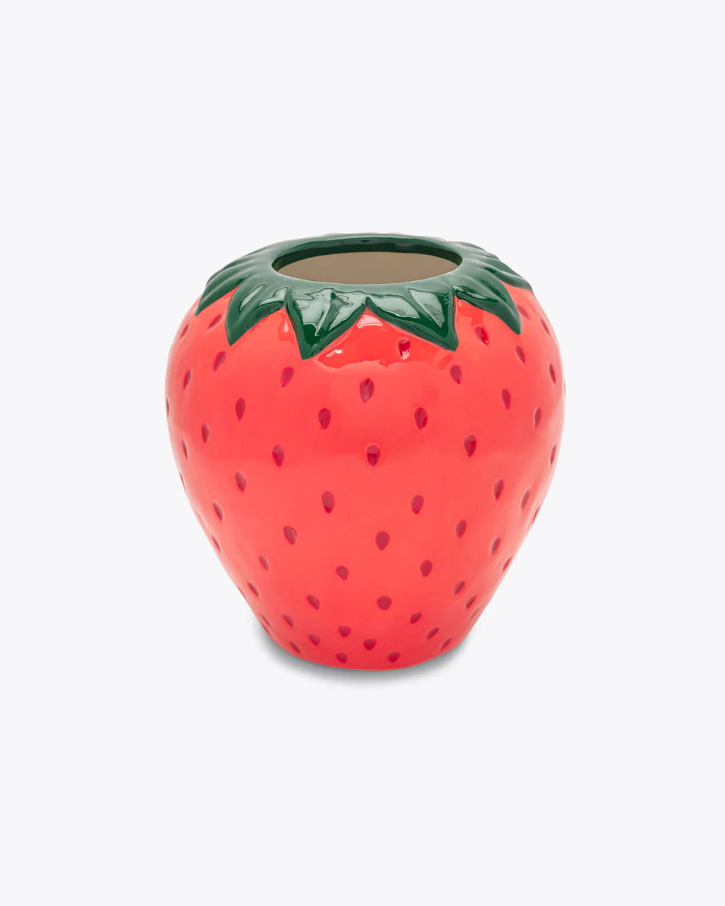 Ceramic strawberry-shaped planter on a white background