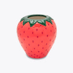 Ceramic strawberry-shaped planter on a white background