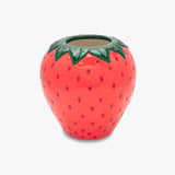 Ceramic strawberry-shaped planter on a white background