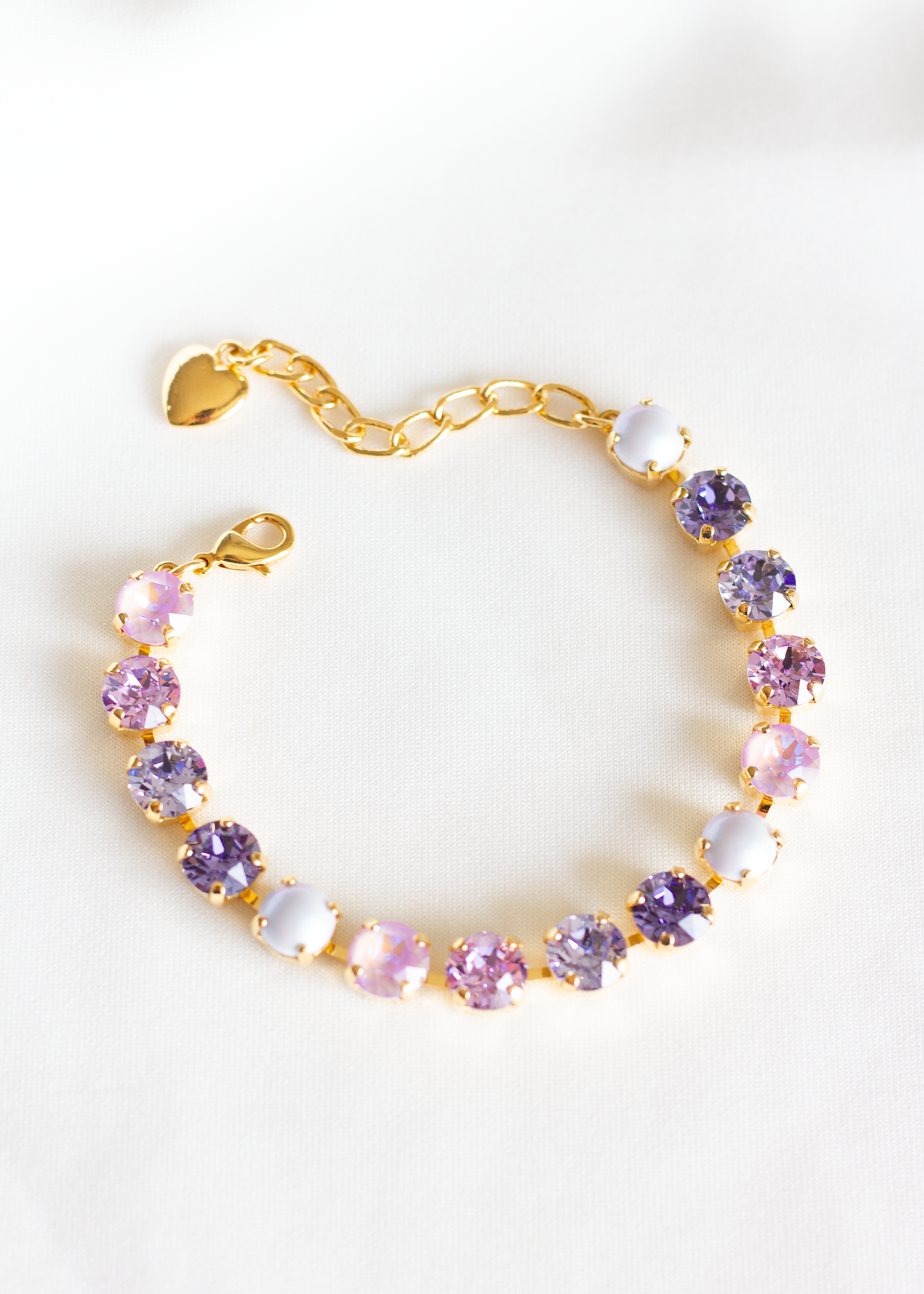 Sparkling Stars Bracelet, jewelry designed and made by Sarah Gauci in Malta. 8mm Crystals. Lilac Clouds. Gold Plated or Rose Gold. 