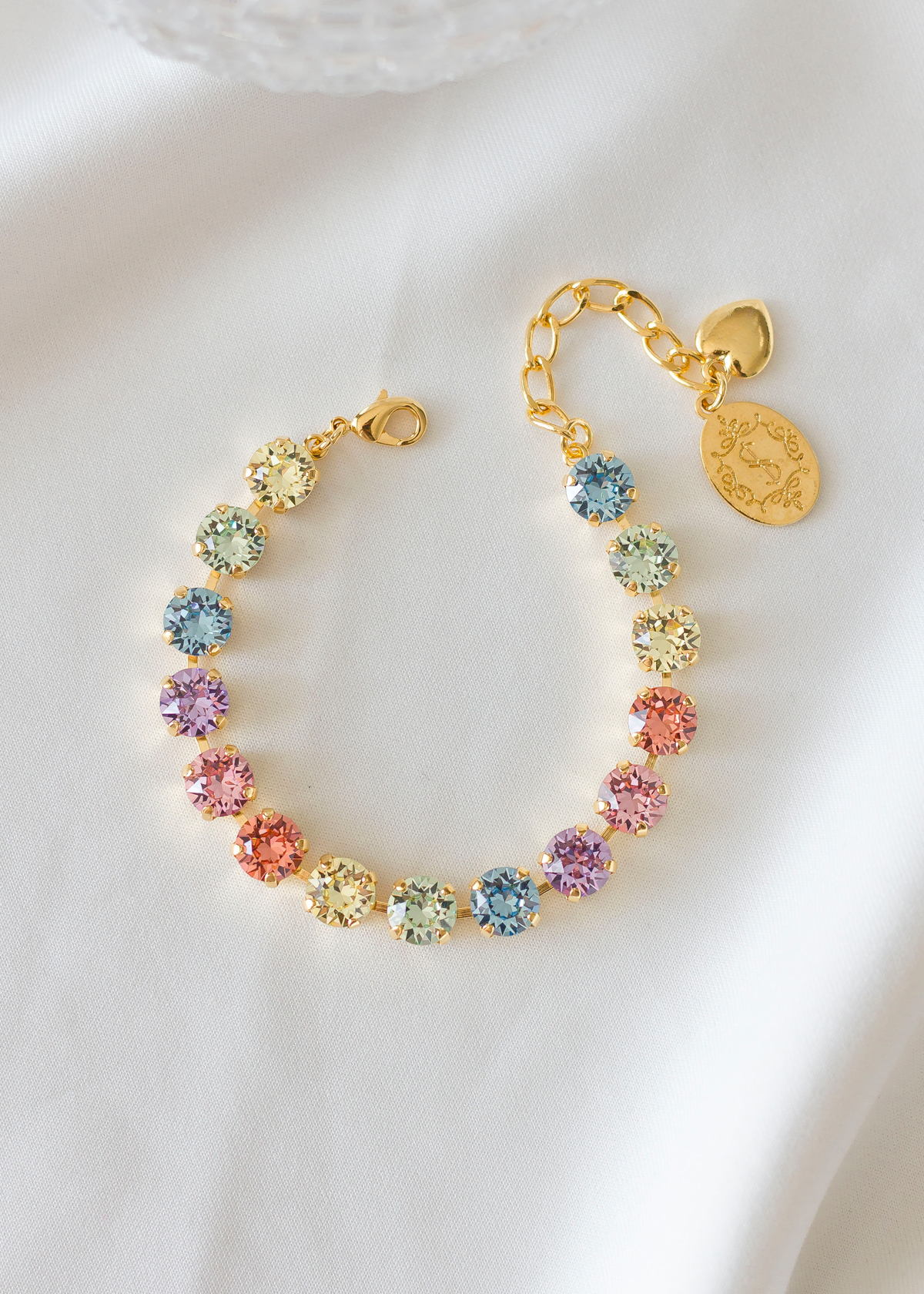 Sparkling Stars Bracelet, jewelry designed and made by Sarah Gauci in Malta. 8mm Pastel Crystals. 16K gold plated, Rose Gold or silver plated.