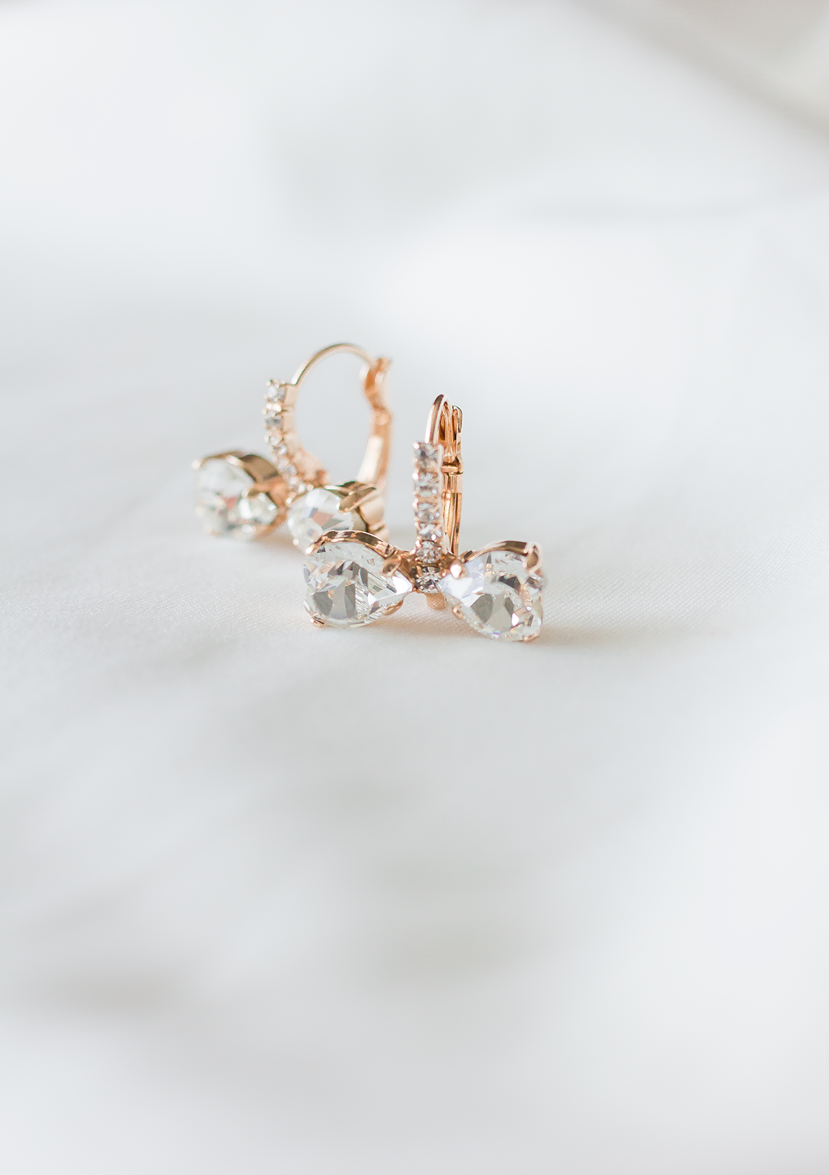 Marie Bow earrings, jewelry designed and made by Sarah Gauci in Malta. Rose Gold Plating. 