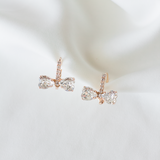 Marie Bow earrings, jewelry designed and made by Sarah Gauci in Malta. Rose Gold Plating. 