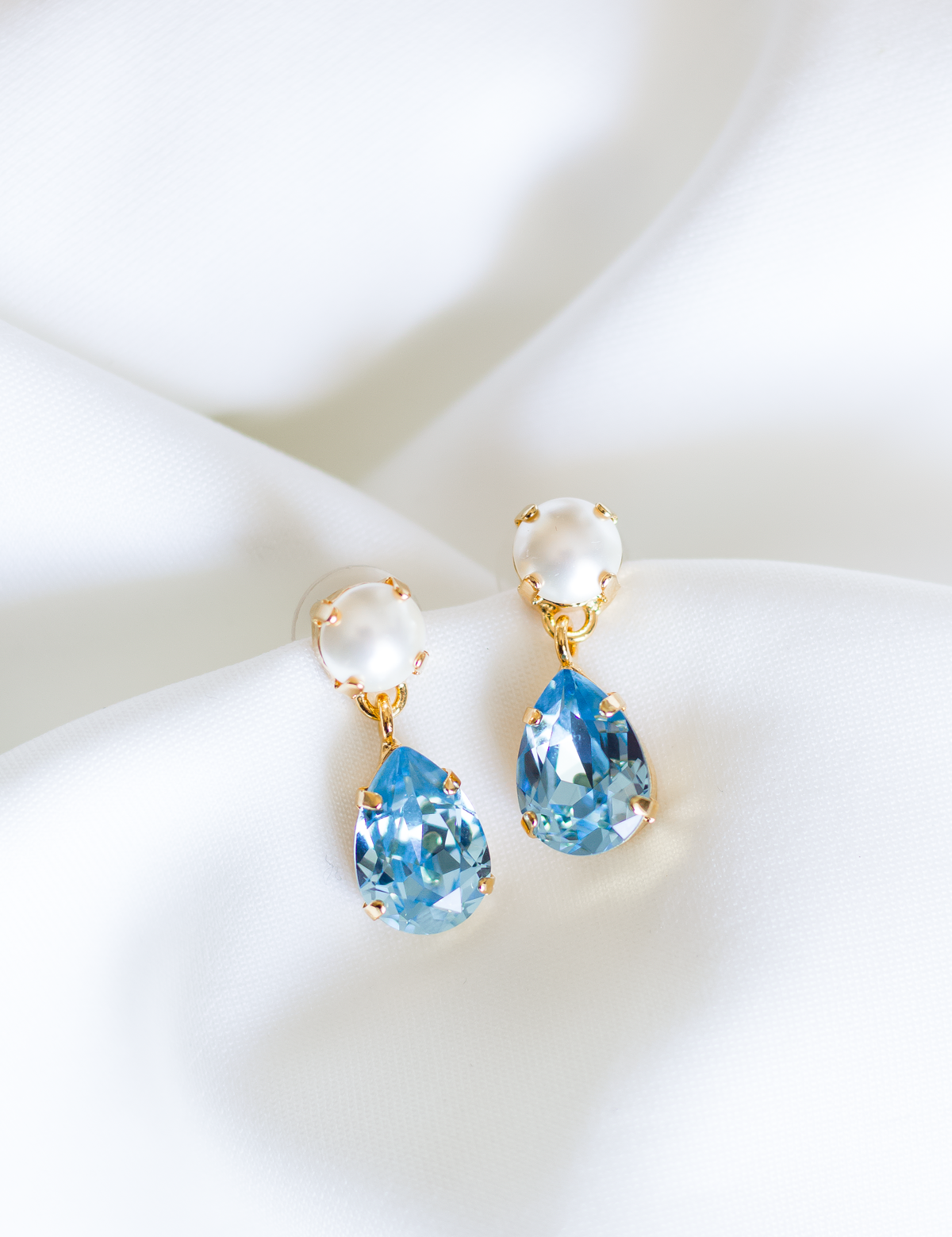 Sara Drops, jewelry designed and made by Sarah Gauci in Malta. 2.4cm length. Aquamarine & Pearl. Gold or Rose Gold Plated.