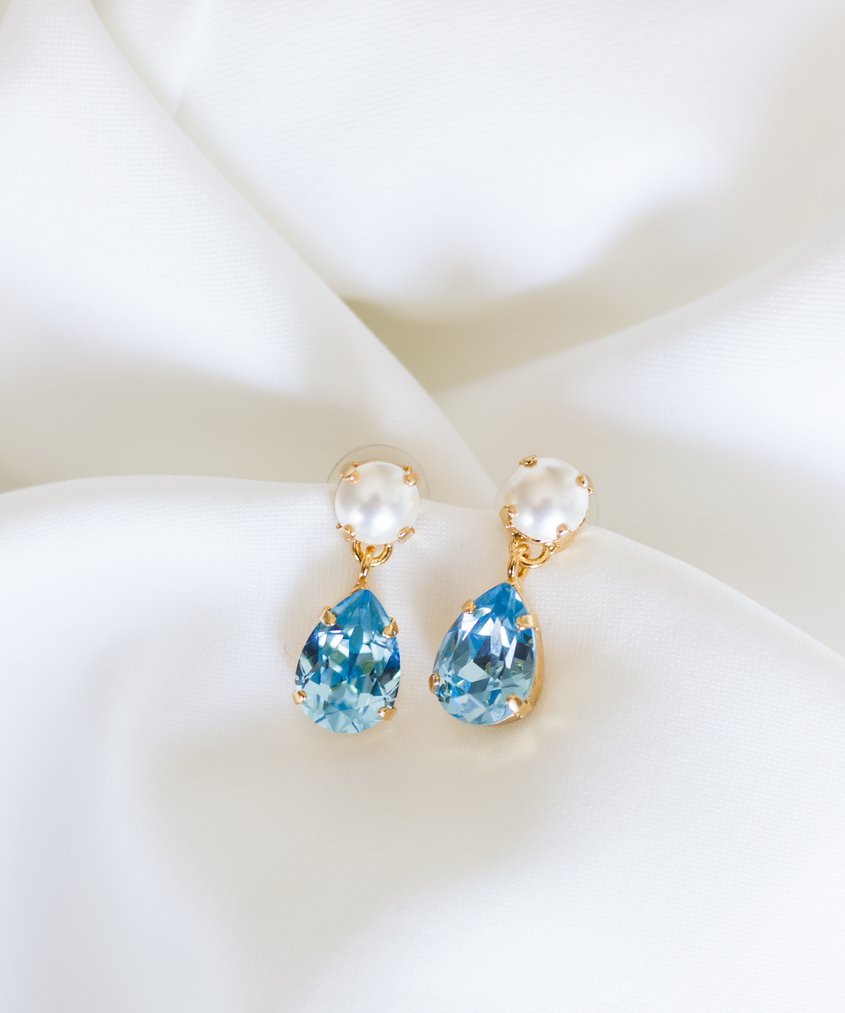 Sara Drops, jewelry designed and made by Sarah Gauci in Malta. 2.4cm length. Aquamarine & Pearl. Gold or Rose Gold Plated.