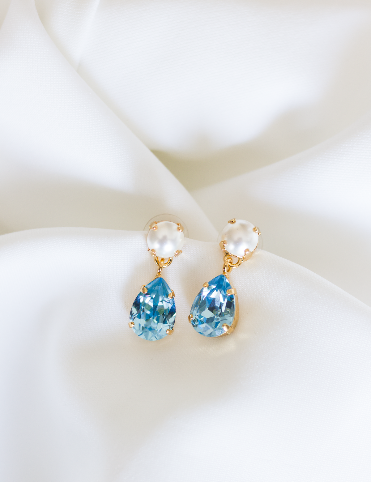 Sara Drops, jewelry designed and made by Sarah Gauci in Malta. 2.4cm length. Aquamarine & Pearl. Gold or Rose Gold Plated.