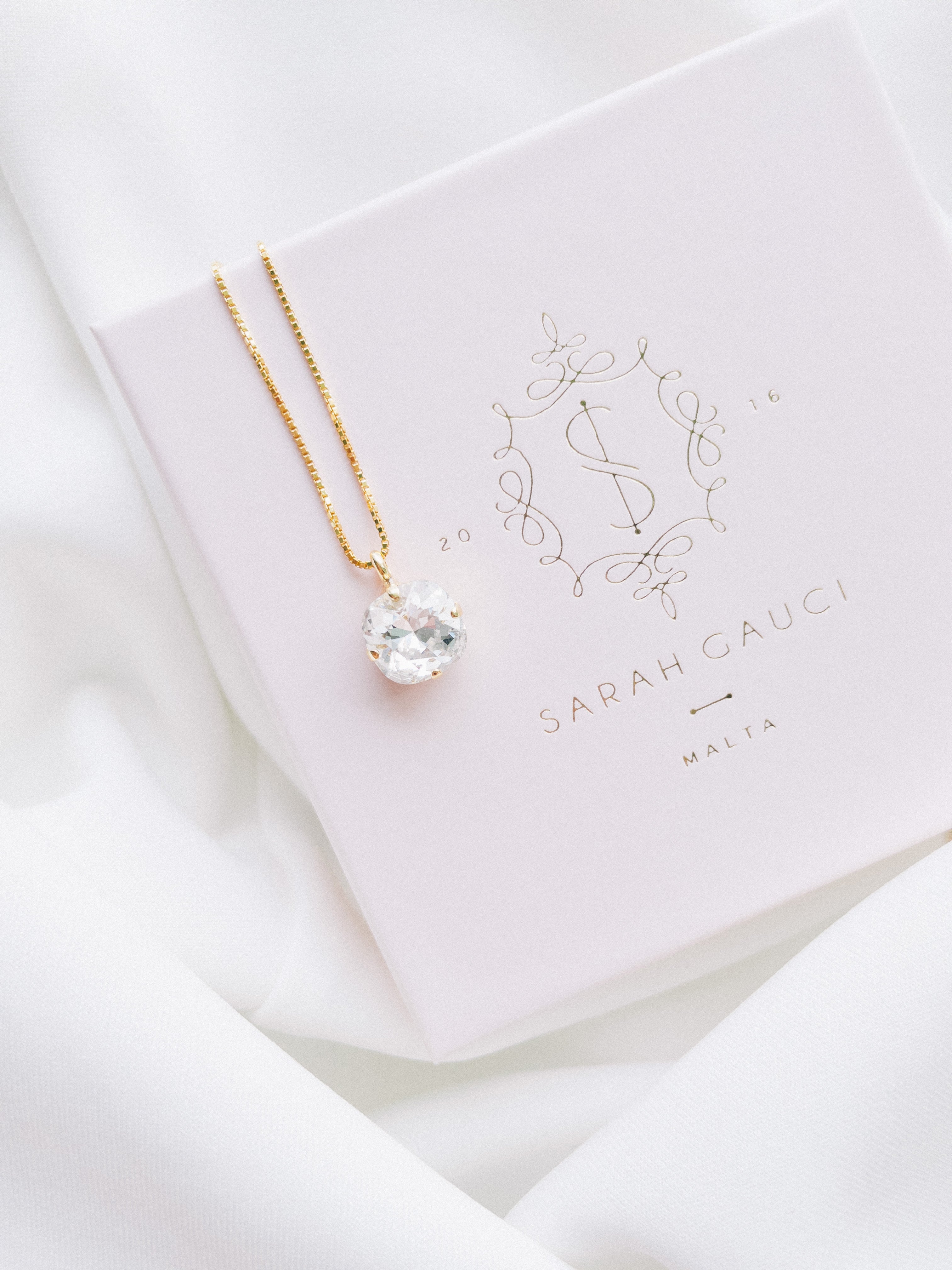 bridal earrings
sarah gauci
wedding jewelry
teardrop earrings
wedding accessories
fine jewelry
elegant bridal style
bride jewelry
wedding sparkle
bridal accessories
timeless wedding style
wedding day jewelry
jewelry for brides
classic wedding look
bridal elegance
luxury wedding jewelry
wedding inspiration
wedding fashion
statement earrings for brides
wedding day details
jewelry for weddings
